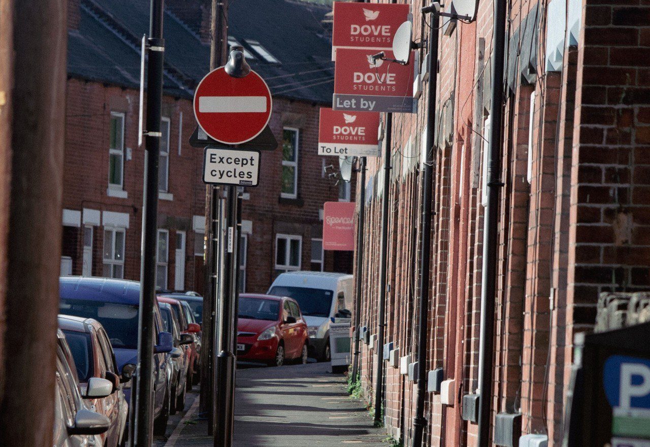 Street with to let signs.