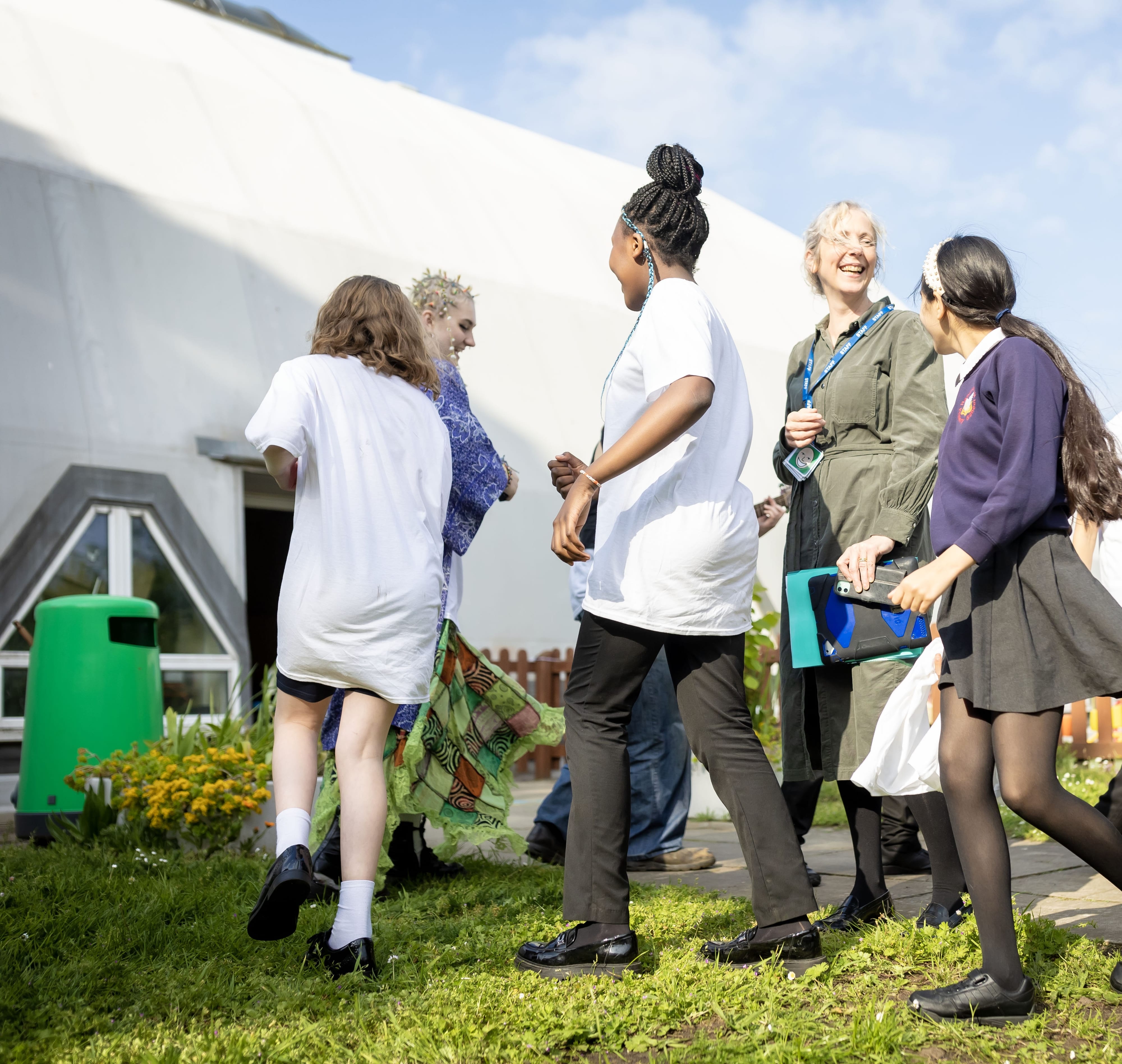 Group of students participating in a creative session outside
