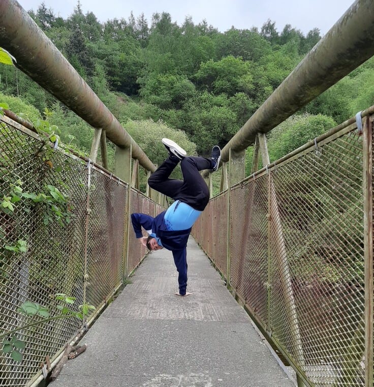 Founder and Director of Avant Cymru, Jaime, teaching break-dancing from home using online tools.