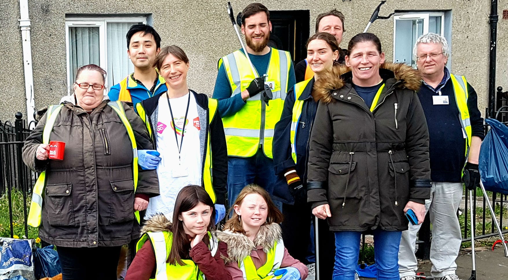 Local residents working together to clean up the neighbourhood as part of their Local Conversation project in Muirhouse, Edinburgh