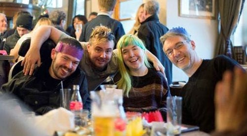 Nu and other members of the Local People project in Brighton socialise together