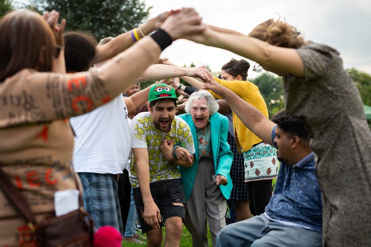 Our Place project members socialise together in a local park