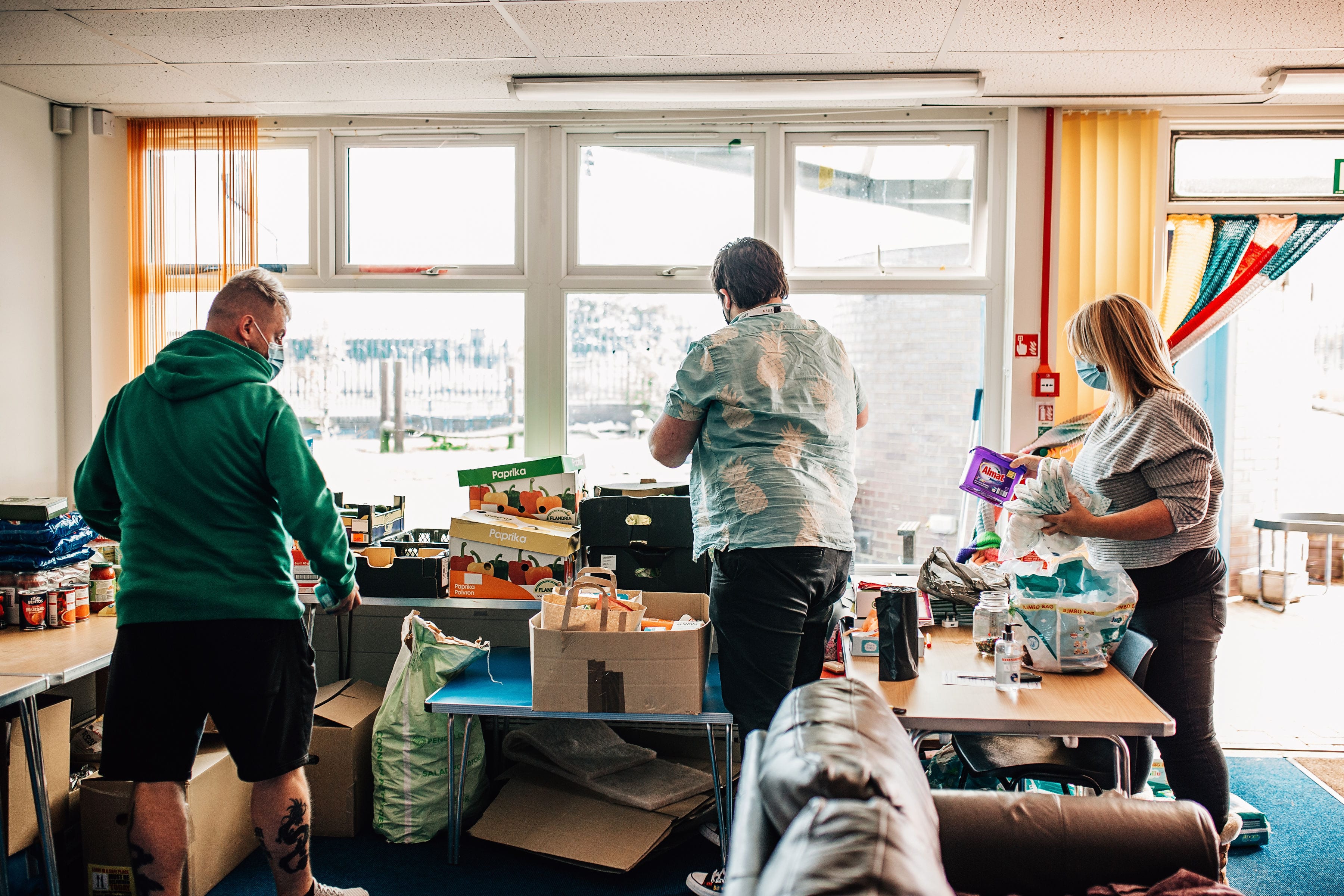 Volunteers at the Local Conversation sorting food packages