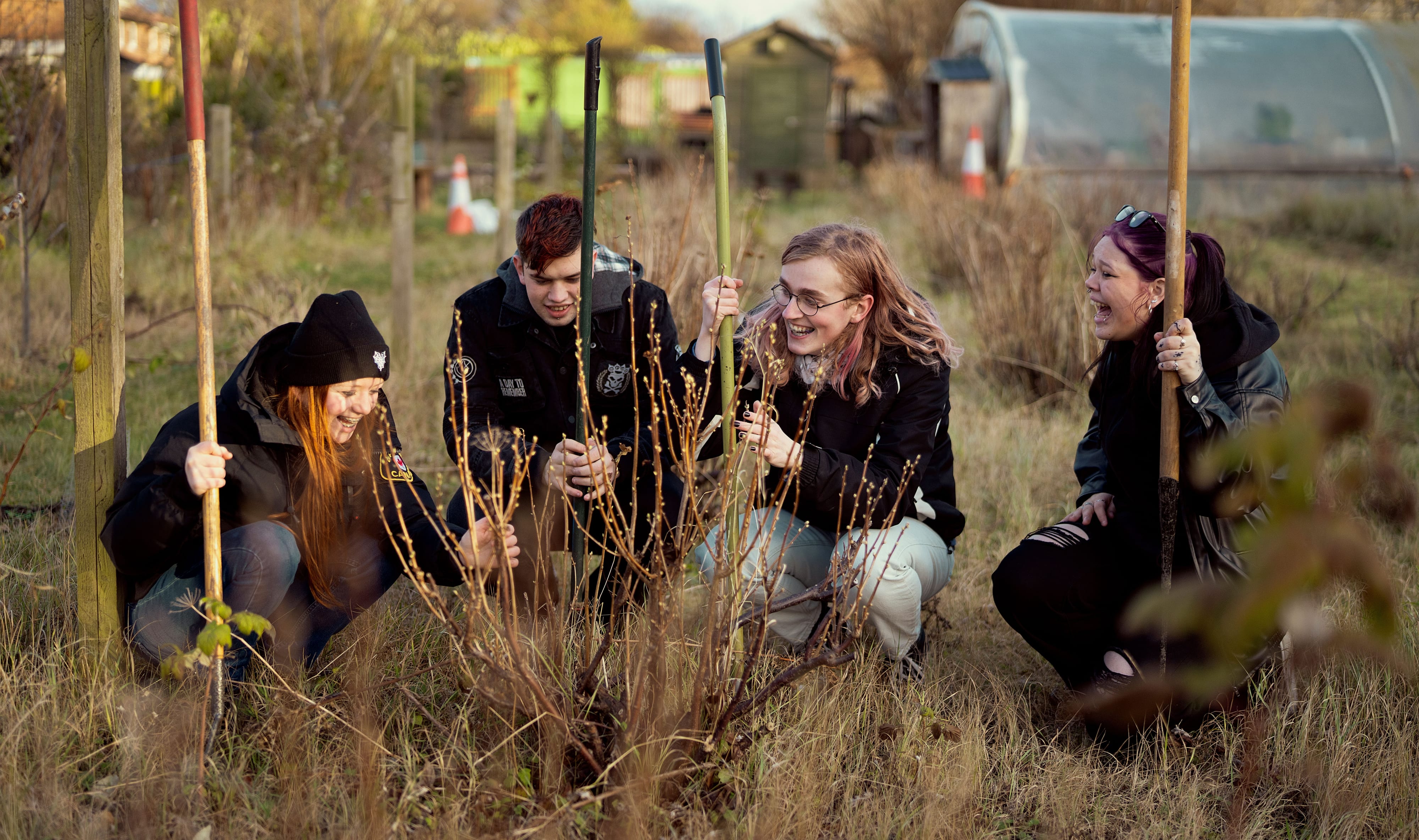A group of young people community garden