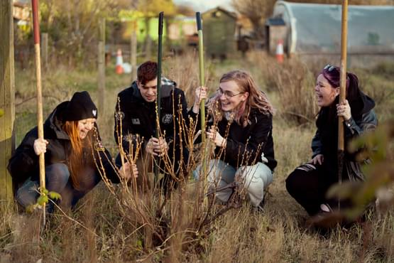 A group of young people community garden