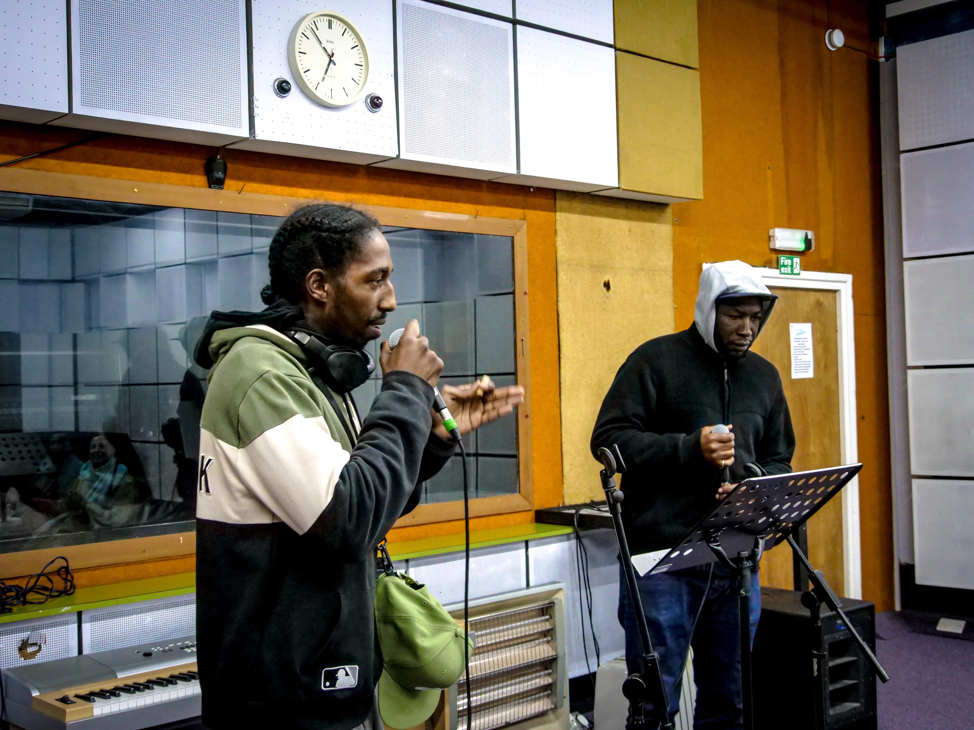 Two men from StereoHype with microphones